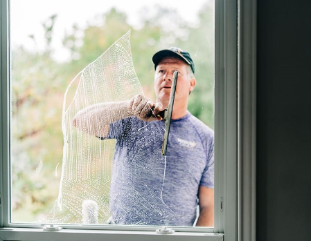 Window Genie tech providing window cleaning service in Crown Point, IN 