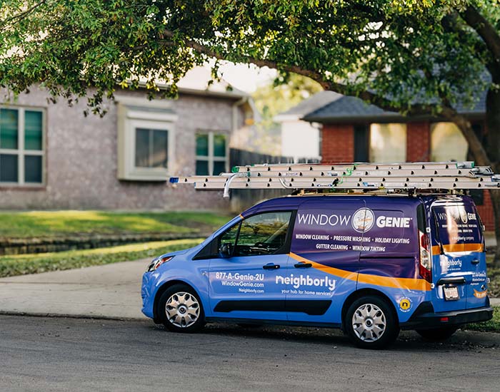 Window Genie van parked outside a brick home in Davidson, NC 