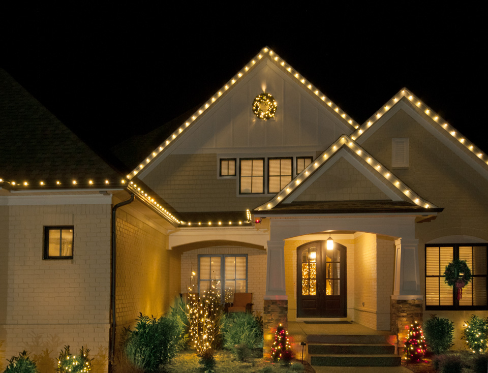 A home decorated with holiday lighting by Window Genie 