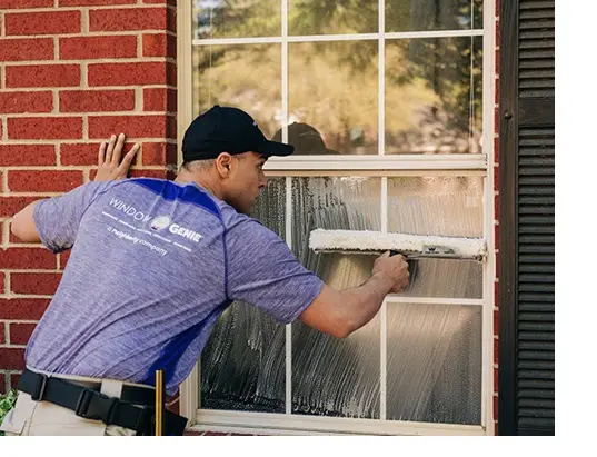 Window Genie tech providing window cleaning service in Clarkston, MI