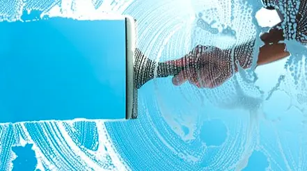 Squeegee cleaning the window